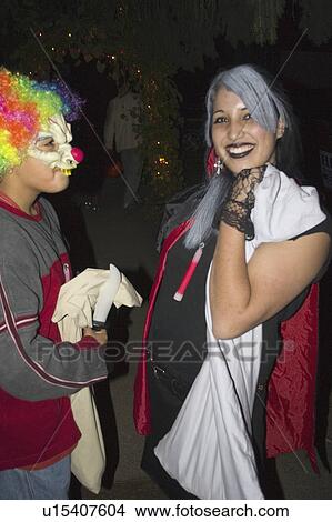 Picture - costumed, treaters, trick, halloween, mom. Fotosearch