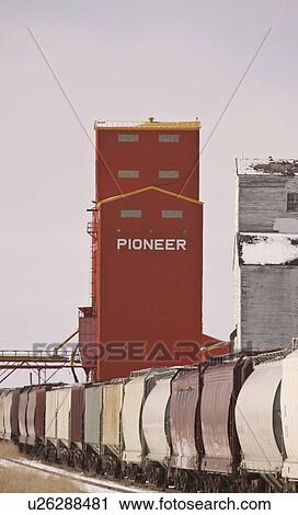 Stock Image - elevators, cars, wooden, two, siding, grain. Fotosearch