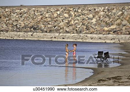end, girls, southeast, water, playing, two View Large Photo Image Stock Image - end, girls, southeast, water, playing, two. Fotosearch