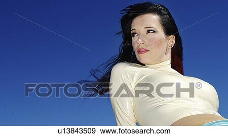 Stock Photo - female, blue, white, wearing, woman. Fotosearch