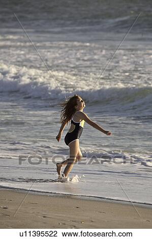 florida, girl, beach, down, running, young View Large Photo Image Stock Image - florida, girl, beach, down, running, young. Fotosearch