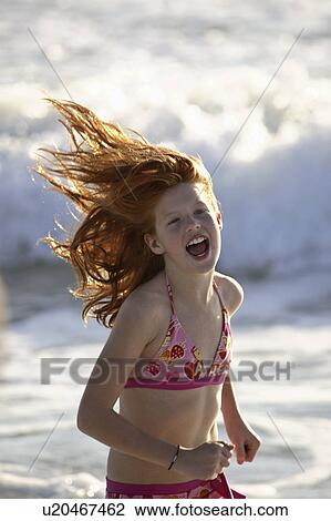 florida, girl, beach, down, running, young View Large Photo Image Stock Image - florida, girl, beach, down, running, young. Fotosearch