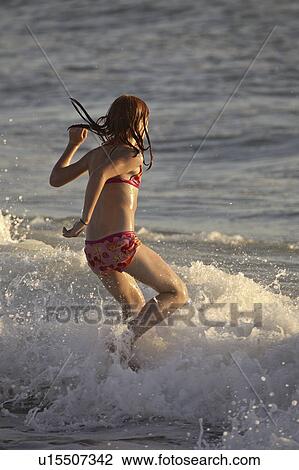 florida, girl, beach, surf, enjoying, young View Large Photo Image Stock Image - florida, girl, beach, surf, enjoying, young. Fotosearch