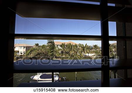 Stock Photo - florida, view, scenic, neighborhood, lovely, shuttered. Fotosearch