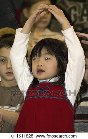 Stock Photo - girl, solo, singing, age, asian. Fotosearch