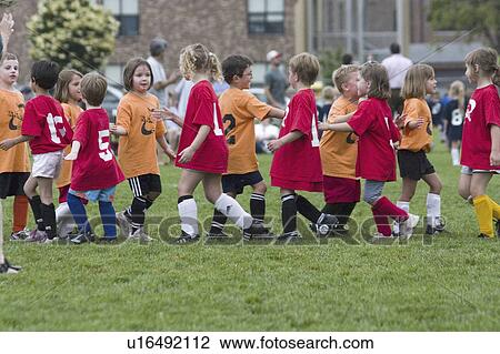 girls, soccer, highfiving, age, boys View Large Photo Image Stock Image - girls, soccer, highfiving, age, boys. Fotosearch
