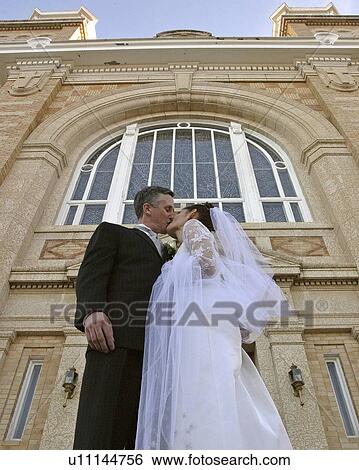 Stock Photograph - groom, cathedral, gravelbourg, outside, bride. Fotosearch