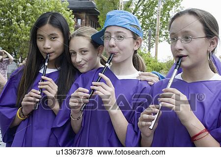 Stock Photo - heart, group, recorder, playing, teens, multiracial. Fotosearch