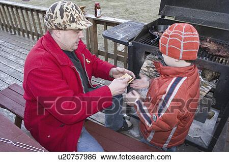 helping, marshmallow, heated, squish, dad View Large Photo Image Stock Photograph - helping, marshmallow, heated, squish, dad. Fotosearch