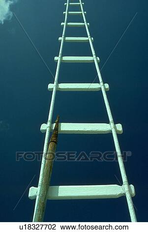 Stock Image - hispanic, ladder, mexico, cozumel, sailboat, white. Fotosearch