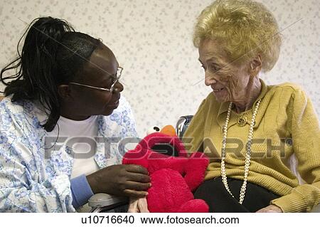 home, american, nursing, talking, attendant, african View Large Photo Image Stock Image - home, american, nursing, talking, attendant, african. Fotosearch