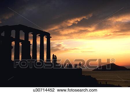 Stock Image - illuminated, columns, silhouetted, poseidon, temple, tall. Fotosearch