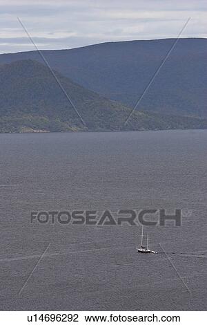 Stock Image - island, half, stewart, bay, moon, sailboat. Fotosearch