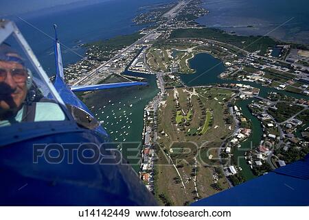 Stock Photo - keys, pilot, florida, view, aerial, biplane. Fotosearch