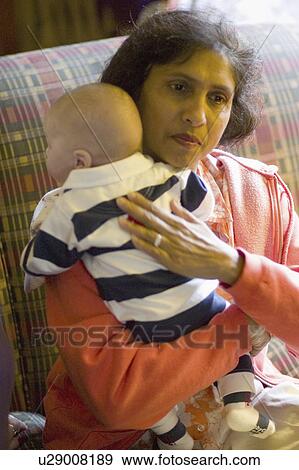 Stock Photo - minnesota, india, paul, infant, holding, grandmother. Fotosearch