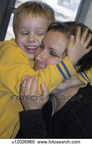 Stock Image - mom, age, hug, good, giving. Fotosearch
