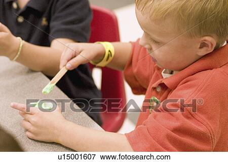 Stock Photo - museum, mixing, science, reaction, chemical, kids. Fotosearch