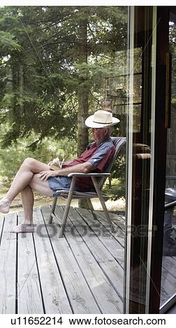 napping, read, good, deck, male View Large Photo Image Picture - napping, read, good, deck, male. Fotosearch