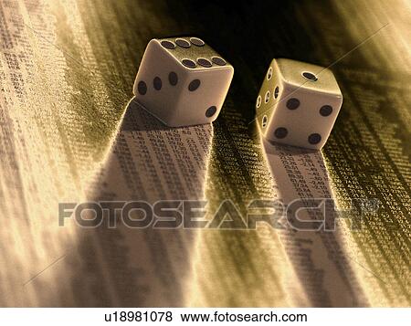 Stock Photo - newspaper, stock, financial, finance, dice. Fotosearch