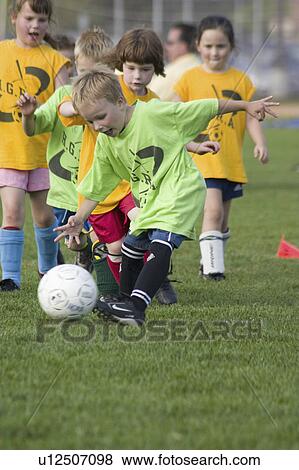 old, soccer, kicking, boy, year View Large Photo Image Stock Photo - old, soccer, kicking, boy, year. Fotosearch