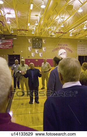 Stock Photo - patrick, speaking, gym, school, high, principal. Fotosearch