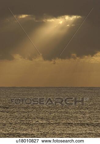 peaking, south, cloud, through, sun View Large Photo Image Stock Photo - peaking, south, cloud, through, sun. Fotosearch