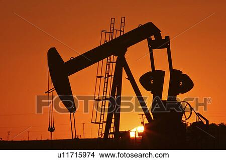 Picture - pump, oilfields, weyburn, jack, sunset. Fotosearch
