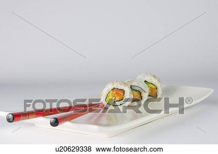 Stock Photo - rice, ready, seaweed, makizushi, sushi, chopsticks. Fotosearch