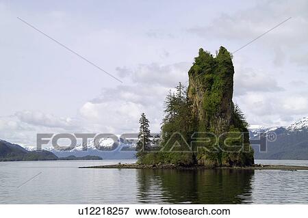 Stock Photo - rising, eddystone, spire, volcanic, rock, new. Fotosearch
