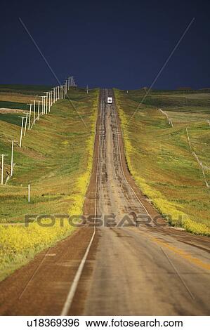 Stock Photograph - road, clouds, country, saskatchewan, seen, storm. Fotosearch