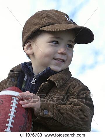 Stock Image - saskatchewan, boy, jaw, moose, posing, young. Fotosearch