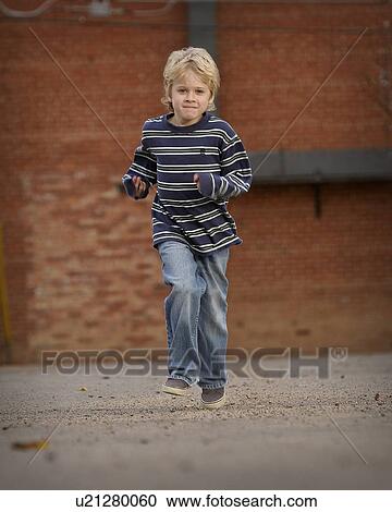 Stock Image - saskatchewan, boy, jaw, moose, posing, young. Fotosearch