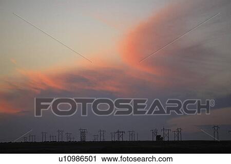 Stock Image - saskatchewan, lit, scenic, sun, set, clouds. Fotosearch