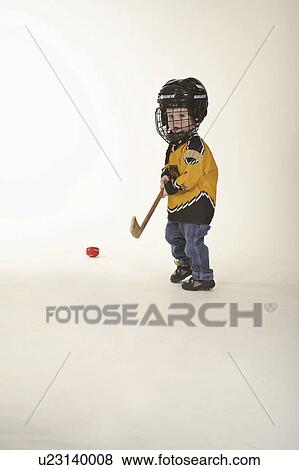 Stock Photo - scenic, boy, jaw, moose, poses, young. Fotosearch