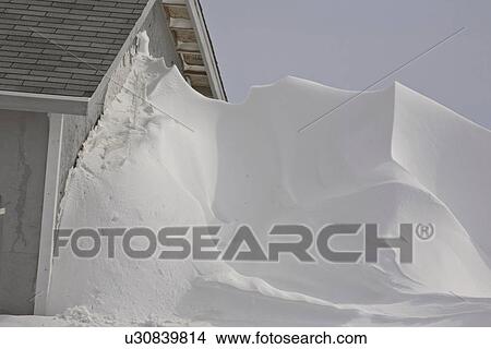 Picture - scenic, snow, building, side, drift, huge. Fotosearch