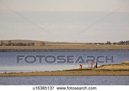 Stock Photo - scenic, sons, diefenbaker, lake, fishing, father. Fotosearch