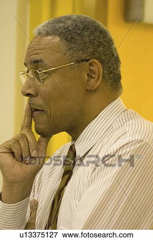 Stock Photo - school, principal, elementary, mann, horace, thoughtful. Fotosearch