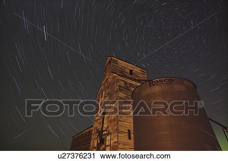 Stock Image - sky, grain, valley, lake, starlit. Fotosearch