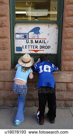 slots, boy, mail, looking, girl, young View Large Photo Image Stock Image - slots, boy, mail, looking, girl, young. Fotosearch