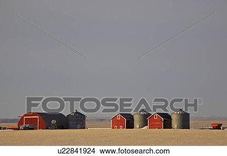 Picture - snow, garage, granaries, bins, grain, red. Fotosearch