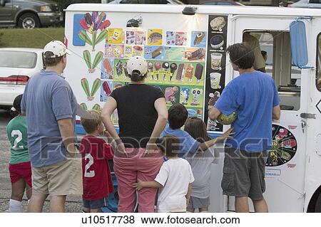 Stock Photo - soccer, buying, truck, cream, ice, families. Fotosearch