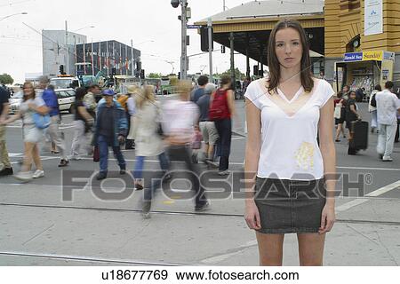 Stock Photo - street, individual, busy, still, standing, young. Fotosearch