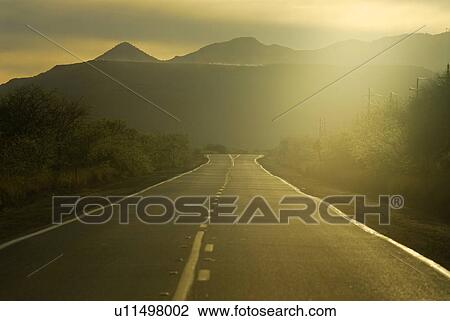 Stock Image - sunset, road, sundown, west, looking, arizona. Fotosearch