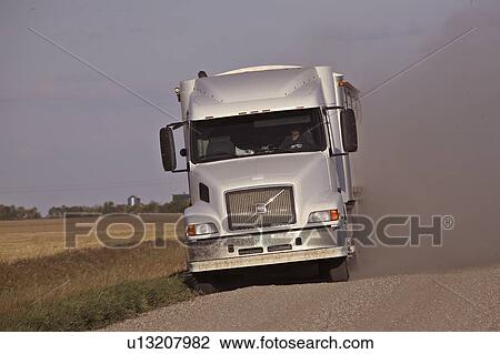 Stock Image - township, truck, dust, up, throwing, grain. Fotosearch