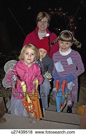 treaters, little, trick, halloween, costumed, mom View Large Photo Image Stock Photo - treaters, little, trick, halloween, costumed, mom. Fotosearch