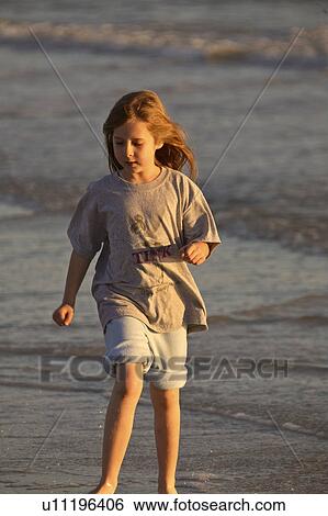 Stock Photograph - usa, enjoying, florida, scenic, beach, girl. Fotosearch