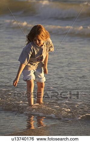 usa, enjoying, florida, scenic, beach, girl View Large Photo Image Stock Photograph - usa, enjoying, florida, scenic, beach, girl. Fotosearch