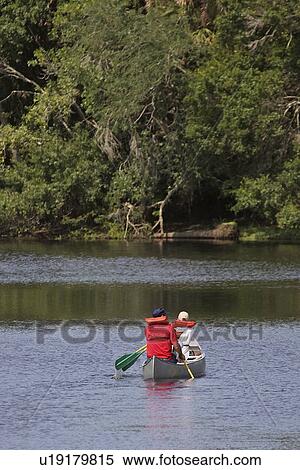 usa, enjoys, florida, scenic, canoing, couple View Large Photo Image Stock Photography - usa, enjoys, florida, scenic, canoing, couple. Fotosearch