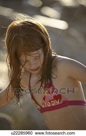 Stock Image - usa, girl, florida, beach, enjoying, young. Fotosearch