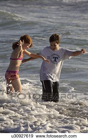 usa, kids, florida, beach, enjoying, children View Large Photo Image Stock Photo - usa, kids, florida, beach, enjoying, children. Fotosearch